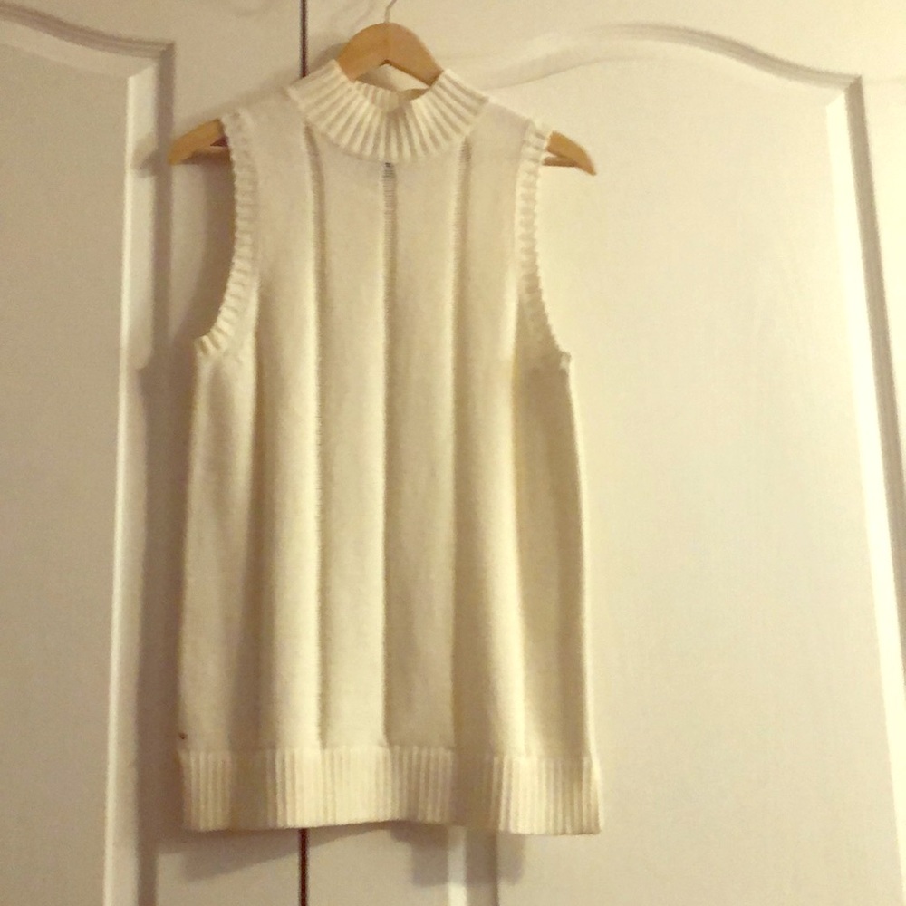 White sleeveless sweater by Whitney port